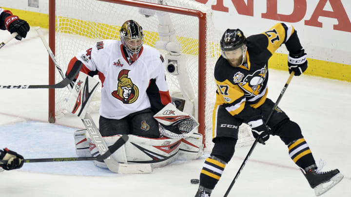 May 25, 2017; Pittsburgh, PA, USA;Pittsburgh Penguins right wing Bryan Rust (17) tries to re-direct the puck past Ottawa Senators goalie Craig Anderson (41) during the second period in game seven of the Eastern Conference Final of the 2017 Stanley Cup Playoffs at PPG PAINTS Arena. Mandatory Credit: Don Wright-USA TODAY Sports