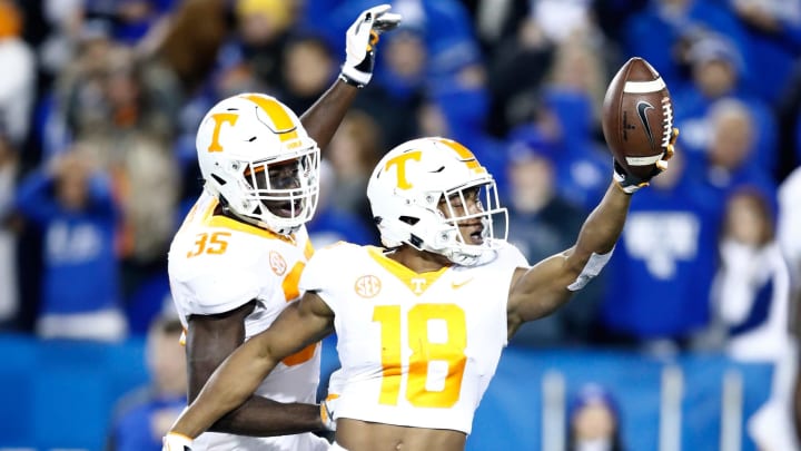 LEXINGTON, KY – OCTOBER 28: Daniel Bituli #35 and Nigel Warrior #18 of the Tennessee Volunteers celebrate a recovered fumble against the Kentucky Wildcats at Commonwealth Stadium on October 28, 2017 in Lexington, Kentucky. (Photo by Andy Lyons/Getty Images)