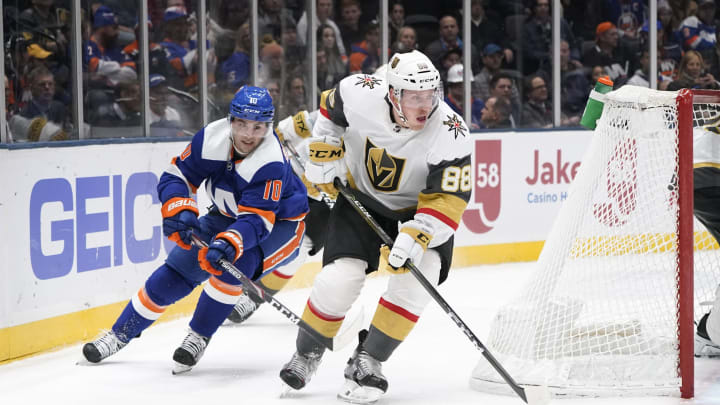 UNIONDALE, NY – DECEMBER 05: Vegas Golden Knights Defenceman Nate Schmidt (88) skates with the puck with New York Islanders Center Derick Brassard (10) defending during the second period of the National Hockey League game between the Las Vegas Golden Knights and the New York Islanders on December 5, 2019, at the Nassau Veterans Memorial Coliseum in Uniondale, NY. (Photo by Gregory Fisher/Icon Sportswire via Getty Images)