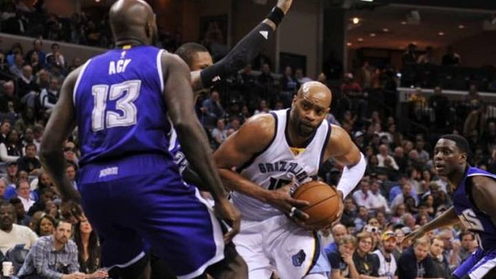 Mar 2, 2016; Memphis, TN, USA; Memphis Grizzlies guard Vince Carter (15) drives to the basket against Sacramento Kings forward Quincy Acy (13) during the first half at FedExForum. Mandatory Credit: Justin Ford-USA TODAY Sports