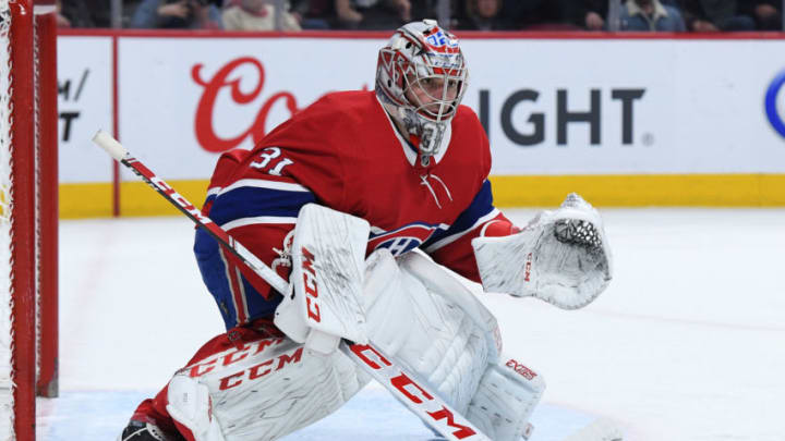 MONTREAL, QC - APRIL 2: Carey Price #31 of the Montreal Canadiens protects the goal against the Tampa Bay Lightning in the NHL game at the Bell Centre on April 2, 2019 in Montreal, Quebec, Canada. (Photo by Francois Lacasse/NHLI via Getty Images)