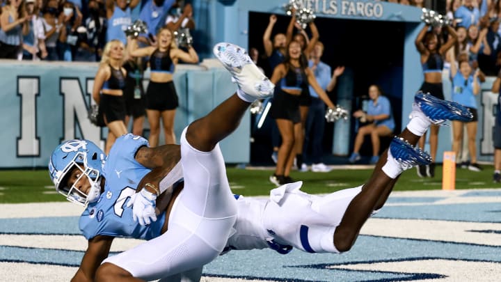 CHAPEL HILL, NORTH CAROLINA – SEPTEMBER 11: Antoine Green #3 of the North Carolina Tar Heels makes a touchdown catch against Jaylon Jones #27 of the Georgia State Panthers during the first half of the game at Kenan Memorial Stadium on September 11, 2021 in Chapel Hill, North Carolina. (Photo by Grant Halverson/Getty Images)