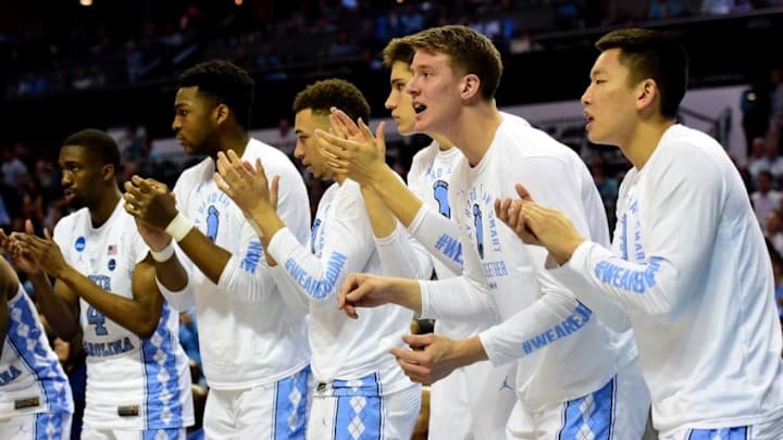 CHARLOTTE, NC - MARCH 18: The North Carolina Tar Heels bench reacts against the Texas A&M Aggies during the second round of the 2018 NCAA Men's Basketball Tournament at Spectrum Center on March 18, 2018 in Charlotte, North Carolina. (Photo by Jared C. Tilton/Getty Images)
