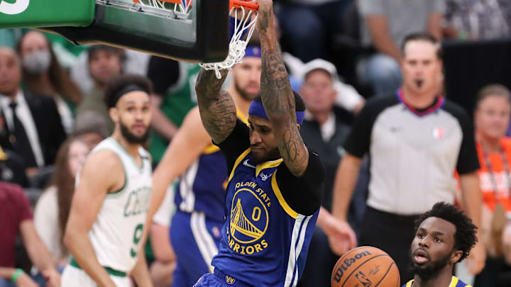 Jun 16, 2022; Boston, Massachusetts, USA; Golden State Warriors guard Gary Payton II (0) dunks and scores against the Boston Celtics during the fourth quarter of game six in the 2022 NBA Finals at the TD Garden. Mandatory Credit: Paul Rutherford-USA TODAY Sports