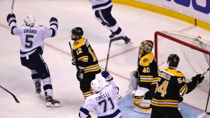 BOSTON, MA - MAY 4: Tampa Bay Lightning Dan Girardi celebrates his overtime winning goal which got by Bruins goalie Tuukka Rask as Bruins Brian Gionta and Adam McQuaid look on. The Boston Bruins host Tampa Bay Lightning in Game Four of the Eastern Conference semifinals at the TD Garden in Boston on May 4, 2018. (Photo by John Tlumacki/The Boston Globe via Getty Images)