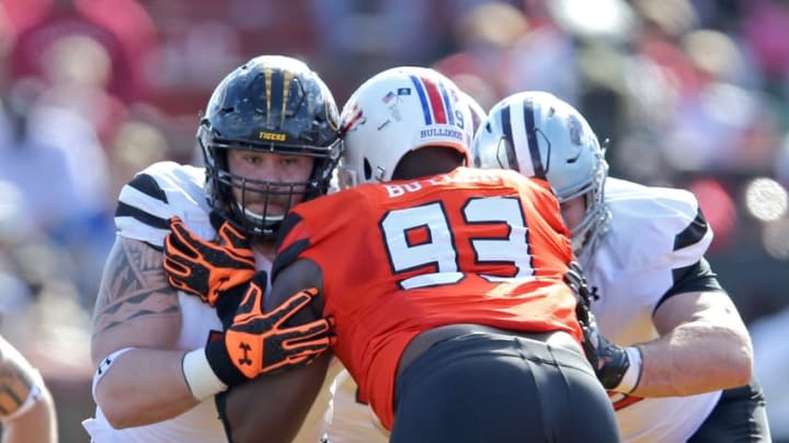 Jan 30, 2016; Mobile, AL, USA; South squad offensive center Evan Boehm of Missouri (77) blocks North squad defensive tackle Vernon Butler of Louisiana Tech (93) in the first quarter of the Senior Bowl at Ladd-Peebles Stadium. Mandatory Credit: Chuck Cook-USA TODAY Sports