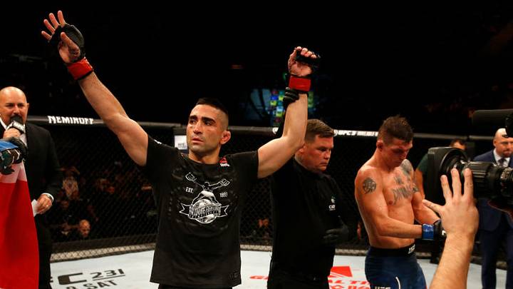 BUENOS AIRES, ARGENTINA - NOVEMBER 17: (L-R) Ricardo Lamas celebrates after defeating Darren Elkins in their featherweight bout during the UFC Fight Night event inside Arena Parque Roca on November 17, 2018 in Buenos Aires, Argentina. (Photo by Alexandre Schneider/Zuffa LLC/Zuffa LLC via Getty Images)