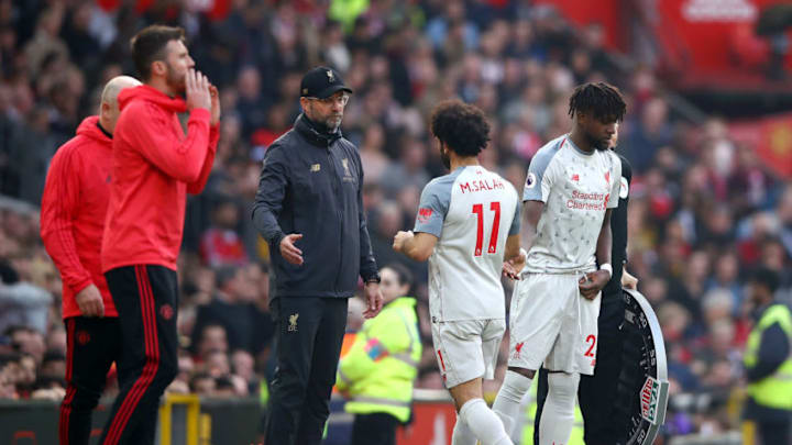 MANCHESTER, ENGLAND - FEBRUARY 24: Mohamed Salah of Liverpool is substituted for Divock Origi of Liverpool during the Premier League match between Manchester United and Liverpool FC at Old Trafford on February 24, 2019 in Manchester, United Kingdom. (Photo by Clive Brunskill/Getty Images)