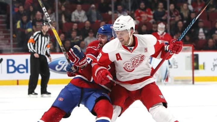 Nov 12, 2016; Montreal, Quebec, CAN; Montreal Canadiens right wing Alexander Radulov (47) falls on ice as he battled for the puck with Detroit Red Wings left wing Justin Abdelkader (8) during the third period at Bell Centre. Mandatory Credit: Jean-Yves Ahern-USA TODAY Sports