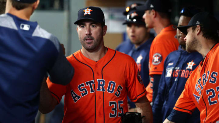 SEATTLE, WASHINGTON - JUNE 06: Justin Verlander #35 of the Houston Astros high fives teammates after exiting the game after giving up one run in seven innings against the Seattle Mariners during their game at T-Mobile Park on June 06, 2019 in Seattle, Washington. (Photo by Abbie Parr/Getty Images)