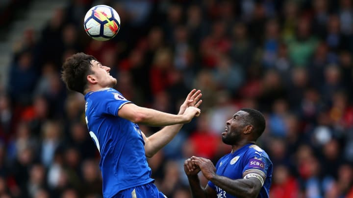 BOURNEMOUTH, ENGLAND – SEPTEMBER 30: Harry Maguire and Wes Morgan of Leicester City jump for the header during the Premier League match between AFC Bournemouth and Leicester City at Vitality Stadium on September 30, 2017 in Bournemouth, England. (Photo by Steve Bardens/Getty Images)