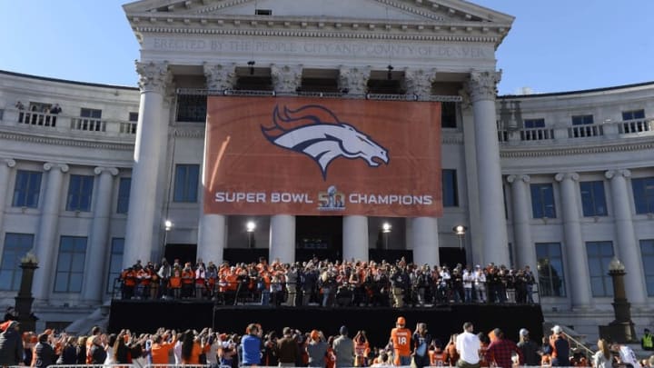 Feb 9, 2016; Denver, CO, USA; Denver Broncos players celebrate during the Super Bowl 50 championship parade at Civic Center Park. Mandatory Credit: Ron Chenoy-USA TODAY Sports