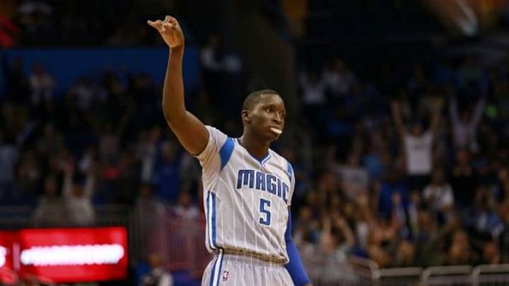 Feb 19, 2016; Orlando, FL, USA; Orlando Magic guard Victor Oladipo (5) looks on as he makes a three pointer against the Dallas Mavericks during overtime at Amway Center. Orlando defeated Dallas 110-104. Mandatory Credit: Kim Klement-USA TODAY Sports