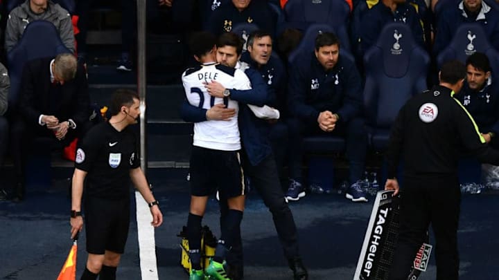 LONDON, ENGLAND - APRIL 30: Dele Alli of Tottenham Hotspur and Mauricio Pochettino, Manager of Tottenham Hotspur embrace after he is subbed during the Premier League match between Tottenham Hotspur and Arsenal at White Hart Lane on April 30, 2017 in London, England. (Photo by Dan Mullan/Getty Images)