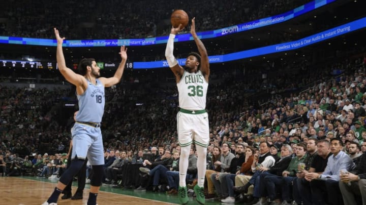 BOSTON, MA - JANUARY 18: Marcus Smart #36 of the Boston Celtics shoots the ball against the Memphis Grizzlies on January 18, 2019 at the TD Garden in Boston, Massachusetts. NOTE TO USER: User expressly acknowledges and agrees that, by downloading and or using this photograph, User is consenting to the terms and conditions of the Getty Images License Agreement. Mandatory Copyright Notice: Copyright 2019 NBAE (Photo by Brian Babineau/NBAE via Getty Images)