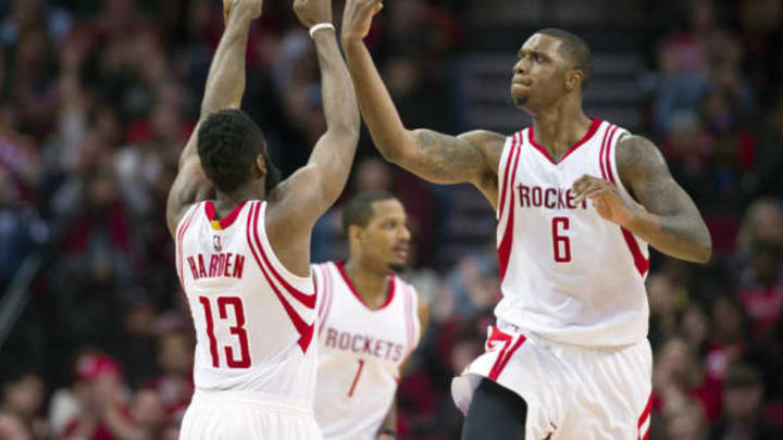 Jan 22, 2016; Houston, TX, USA; Houston Rockets guard James Harden (13) and forward Trevor Ariza (1) and forward Terrence Jones (6) celebrate during the second half against the Milwaukee Bucks at the Toyota Center. The Rockets defeat the Bucks 102-98. Mandatory Credit: Jerome Miron-USA TODAY Sports