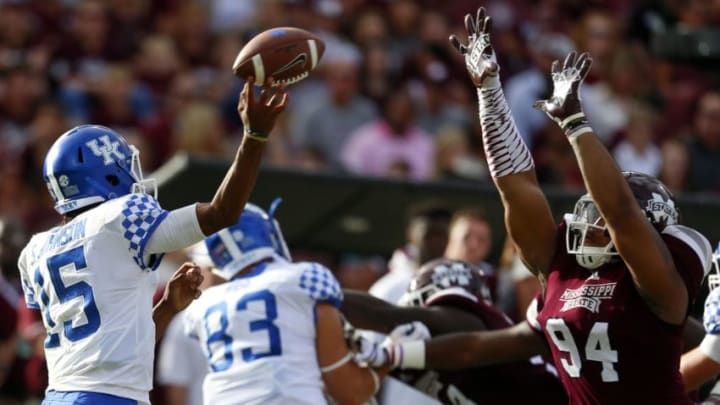 STARKVILLE, MS - OCTOBER 21: Stephen Johnson #15 of the Kentucky Wildcats throws a pass as Jeffery Simmons #94 of the Mississippi State Bulldogs tries to defend during the first half of an NCAA football game at Davis Wade Stadium on October 21, 2017 in Starkville, Mississippi. (Photo by Butch Dill/Getty Images)