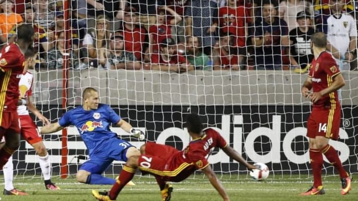 Jun 22, 2016; Sandy, UT, USA; New York Red Bulls goalkeeper Luis Robles (31) cannot make the save on a goal by Real Salt Lake midfielder Jordan Allen (70) in the second half at Rio Tinto Stadium. Mandatory Credit: Jeff Swinger-USA TODAY Sports