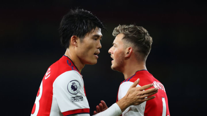 LONDON, ENGLAND - OCTOBER 18: Takehiro Tomiyasu and Ben White of Arsenal during the Premier League match between Arsenal and Crystal Palace at Emirates Stadium on October 18, 2021 in London, England. (Photo by Catherine Ivill/Getty Images)