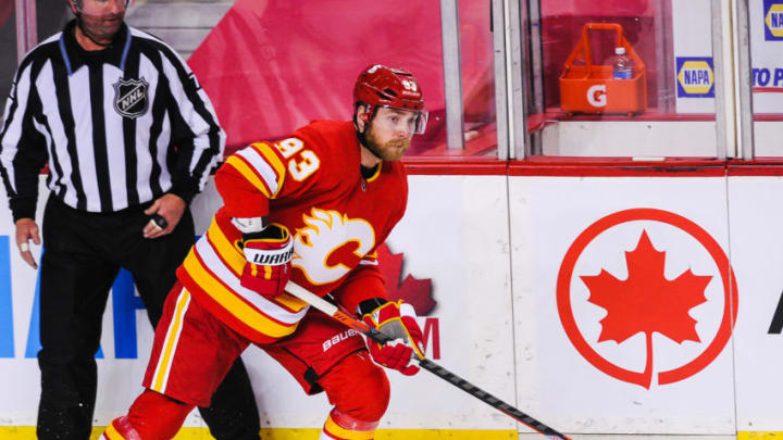 CALGARY, AB - JANUARY 18: Sam Bennett #93 of the Calgary Flames in action against the Vancouver Canucks during an NHL game at Scotiabank Saddledome on January 18, 2021 in Calgary, Alberta, Canada. (Photo by Derek Leung/Getty Images)