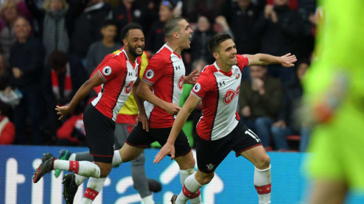 SOUTHAMPTON, ENGLAND - APRIL 28: Dusan Tadic of Southampton celebrates scoring his side's second goal with Nathan Redmond and Oriol Romeu during the Premier League match between Southampton and AFC Bournemouth at St Mary's Stadium on April 28, 2018 in Southampton, England. (Photo by Mike Hewitt/Getty Images)