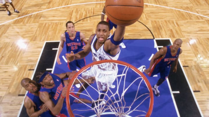 Tracy McGrady goes up for a dunk in a Playoff game against the Detroit Pistons. Photo courtesy of Getty Images.