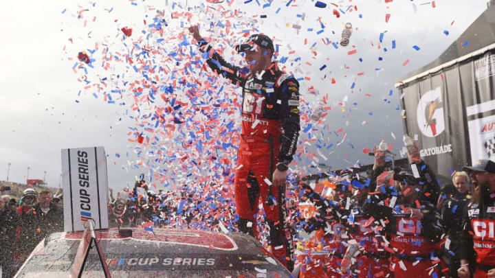 FONTANA, CALIFORNIA - MARCH 01: Alex Bowman, driver of the #88 Cincinnati Chevrolet, celebrates in Victory Lane after winning the NASCAR Cup Series Auto Club 400 at Auto Club Speedway on March 01, 2020 in Fontana, California. (Photo by Stacy Revere/Getty Images)