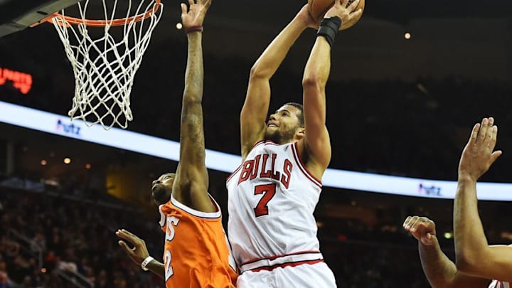 Jan 4, 2017; Cleveland, OH, USA; Chicago Bulls guard Michael Carter-Williams (7) drives to the basket against Cleveland Cavaliers guard Jordan McRae (12) during the second half at Quicken Loans Arena. The Bulls won 106-94. Mandatory Credit: Ken Blaze-USA TODAY Sports