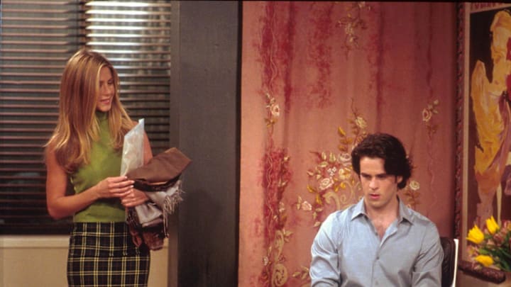 382997 02: Jennifer Aniston (as Rachel) and Eddie Cahill act in a scene from “Friends” (Season 7, “The One With Rachel”s Assistant”). (Photo by NBC/Newsmakers)