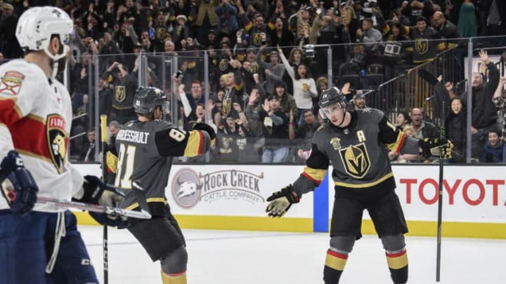 LAS VEGAS, NV - DECEMBER 17: (L-R) Jonathan Marchessault #81 and Reilly Smith #19 of the Vegas Golden Knights celebrate after scoring a goal against the Florida Panthers during the game at T-Mobile Arena on December 17, 2017 in Las Vegas, Nevada. (Photo by Jeff Bottari/NHLI via Getty Images)