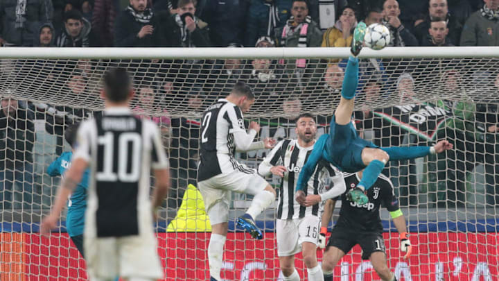 TURIN, ITALY - APRIL 03: Cristiano Ronaldo of Real Madrid scores his sides second goal during the UEFA Champions League Quarter Final Leg One match between Juventus and Real Madrid at Allianz Stadium on April 3, 2018 in Turin, Italy. (Photo by Emilio Andreoli/Getty Images)