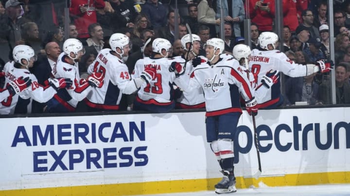 LOS ANGELES, CA - DECEMBER 4: John Carlson #74 of the Washington Capitals celebrates his goal with teammates during the first period against the Los Angeles Kings at STAPLES Center on December 4, 2019 in Los Angeles, California. (Photo by Andrew D. Bernstein/NHLI via Getty Images)