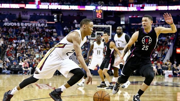 Mar 20, 2016; New Orleans, LA, USA; New Orleans Pelicans guard Tim Frazier (2) drives past Los Angeles Clippers guard Austin Rivers (25) during the second half of a game at the Smoothie King Center. The Pelicans defeated the Clippers 109-105. Mandatory Credit: Derick E. Hingle-USA TODAY Sports
