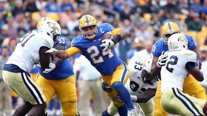 Oct 8, 2016; Pittsburgh, PA, USA; Pittsburgh Panthers running back James Conner (24) rushes the ball against the Georgia Tech Yellow Jackets during the third quarter at Heinz Field. Pittsburgh won 37-34. Mandatory Credit: Charles LeClaire-USA TODAY Sports