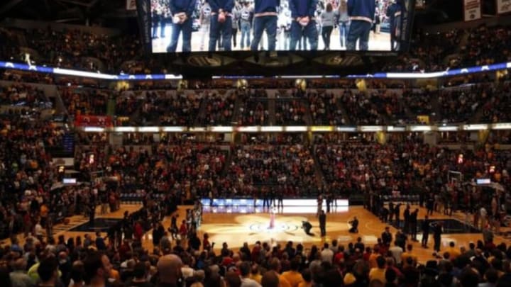 Dec 23, 2015; Indianapolis, IN, USA; Indiana Pacers and the Sacramento Kings stand at attention during the playing of the National Anthem at Bankers Life Fieldhouse. Mandatory Credit: Brian Spurlock-USA TODAY Sports