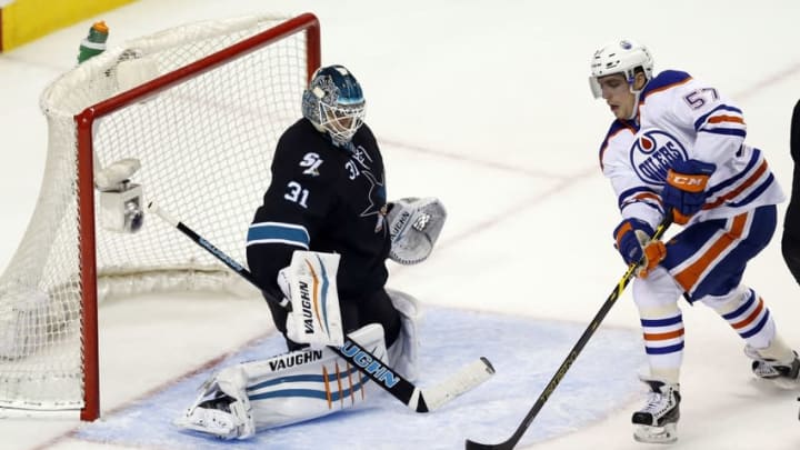 Dec 18, 2014; San Jose, CA, USA; Edmonton Oilers left wing David Perron (57) has a shot blocked by San Jose Sharks goalie Antti Niemi (31) during the third periodat SAP Center at San Jose. San Jose won 4-3. Mandatory Credit: Bob Stanton-USA TODAY Sports