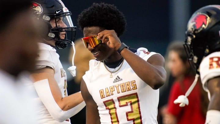 Ravenwood’s Myles Pollard (13) chats with teammates during the first half against MBA at Montgomery Bell Academy in Nashville, Tenn., Friday, Aug. 20, 2021.Mba Rhs Fb 082021 An 008