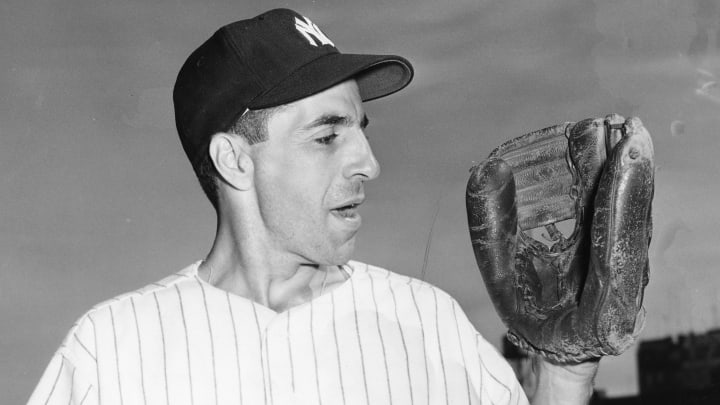 Aug 15, 2007 – West Orange, NJ, USA – PHIL RIZZUTO, known by admirers as ‘The Scooter’ died in his nursing home on Aug. 14, 2007, at the age of 89 due to failing health and pneumonia. Rizzuto helped the Yankees win seven World Series during his 13 years, including their record five straight titles from 1949 through 1953 and in 1950 he won the American League’s Most Valuable Player award. His popularity as a broadcaster from 1956-1996 launched him to a pop culture icon with his trademark phrases like ‘Holy Cow!’ and ‘You huckleberry!’ File Photo, date unknown. (Photo by Sporting News/Sporting News via Getty Images)
