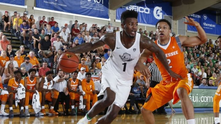 Nov 22, 2016; Maui, HI, USA; Oregon Ducks forward Jordan Bell (1) drives to the basket against Tennessee Volunteers forward Grant Williams (2) during the Maui Jim Maui Invitational at the Lahaina Civic Center. Mandatory Credit: Brian Spurlock-USA TODAY Sports