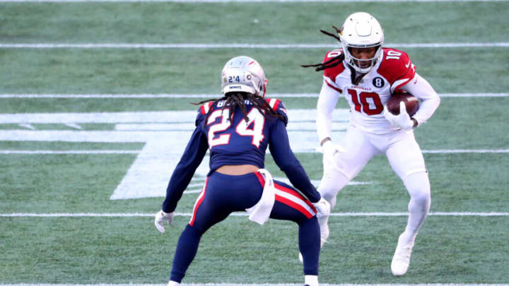 FOXBOROUGH, MASSACHUSETTS - NOVEMBER 29: DeAndre Hopkins #10 of the Arizona Cardinals runs with the ball against Stephon Gilmore #24 of the New England Patriots during the second quarter of the game at Gillette Stadium on November 29, 2020 in Foxborough, Massachusetts. (Photo by Maddie Meyer/Getty Images)