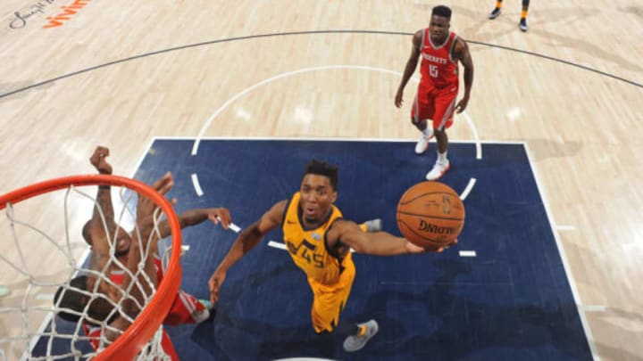 SALT LAKE CITY, UT – MAY 6: Donovan Mitchell #45 of the Utah Jazz shoots the ball against the Houston Rockets during Game Four of the Western Conference Semifinals of the 2018 NBA Playoffs on May 6, 2018 at the Vivint Smart Home Arena Salt Lake City, Utah. NOTE TO USER: User expressly acknowledges and agrees that, by downloading and or using this photograph, User is consenting to the terms and conditions of the Getty Images License Agreement. Mandatory Copyright Notice: Copyright 2018 NBAE (Photo by Andrew D. Bernstein/NBAE via Getty Images)