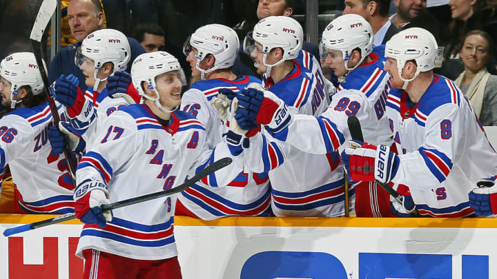 NASHVILLE, TENNESSEE – DECEMBER 29: Jesper Fast #17 of the New York Rangers is congratulated by teammates after scoring the go ahead goal against the Nashville Predators during the third period at Bridgestone Arena on December 29, 2018 in Nashville, Tennessee. (Photo by Frederick Breedon/Getty Images)