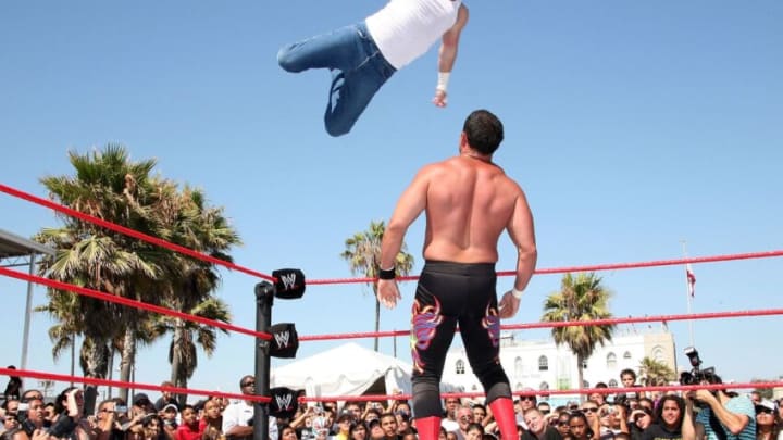 LOS ANGELES - AUGUST 18: Professional Wrestlers Jimmy Wang Yang and Chavo Guerrero (R) battle in WWE Takes Over Venice Beach August 18, 2007 in Los Angeles, California. (Photo by Chad Buchanan/Getty Images)