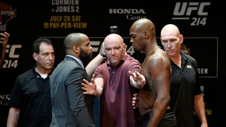 LOS ANGELES, CA - JULY 26: Dana White (C), UFC President, separates the two fighters Daniel Cormier (L) and Jon Jones during the UFC 214 Press Conference at The Novo by Microsoft July 26, 2017 in Los Angeles, California. (Photo by Kevork Djansezian/Zuffa LLC via Getty Images)