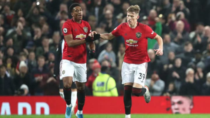 MANCHESTER, ENGLAND – DECEMBER 26: Anthony Martial of Manchester United celebrates with teammate Scott McTominay after scoring his team’s first goal during the Premier League match between Manchester United and Newcastle United at Old Trafford on December 26, 2019 in Manchester, United Kingdom. (Photo by Ian MacNicol/Getty Images)