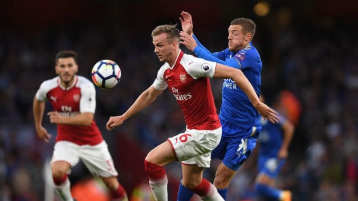 LONDON, ENGLAND - AUGUST 11: Rob Holding of Arsenal is challenged by Jamie Vardy of Leicester City during the Premier League match between Arsenal and Leicester City at the Emirates Stadium on August 11, 2017 in London, England. (Photo by Shaun Botterill/Getty Images)