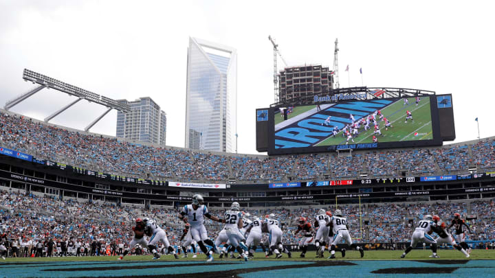 CHARLOTTE, NC – SEPTEMBER 23: Cam Newton #1 hands the ball off to teammate Christian McCaffrey #22 of the Carolina Panthers in the second quarter against the Cincinnati Bengals during their game at Bank of America Stadium on September 23, 2018 in Charlotte, North Carolina. (Photo by Streeter Lecka/Getty Images)