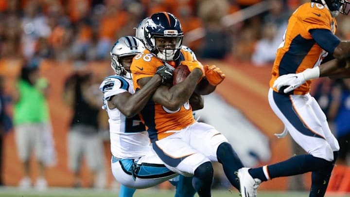 Sep 8, 2016; Denver, CO, USA; Denver Broncos wide receiver Demaryius Thomas (88) is pulled down by Carolina Panthers cornerback James Bradberry (24) in the third quarter at Sports Authority Field at Mile High. Mandatory Credit: Isaiah J. Downing-USA TODAY Sports