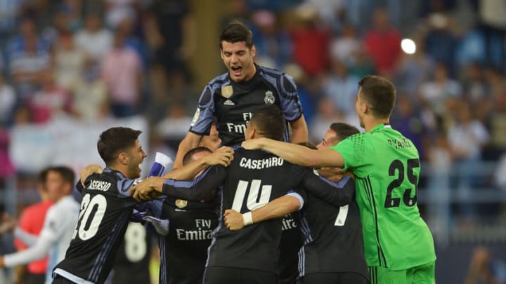 MALAGA, SPAIN - MAY 21: The Real Madrid squad celebrate winning the La Liga title following the La Liga match between Malaga and Real Madrid at La Rosaleda Stadium on May 21, 2017 in Malaga, Spain. (Photo by Aitor Alcalde/Getty Images)