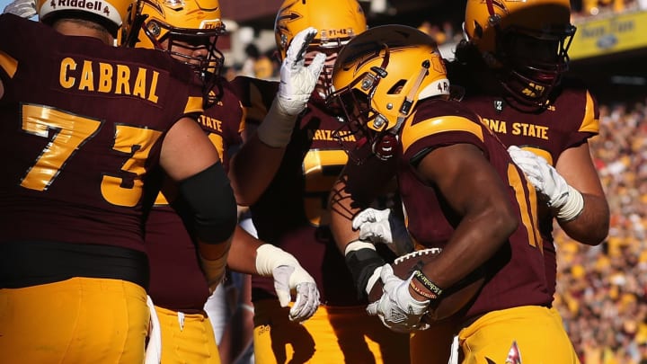 TEMPE, AZ – NOVEMBER 25: Wide receiver Kyle Williams #10 of the Arizona State Sun Devils is congratulated by teammates after catching a 18 yard touchdown against the Arizona Wildcats during the first half of the college football game at Sun Devil Stadium on November 25, 2017 in Tempe, Arizona. (Photo by Christian Petersen/Getty Images)